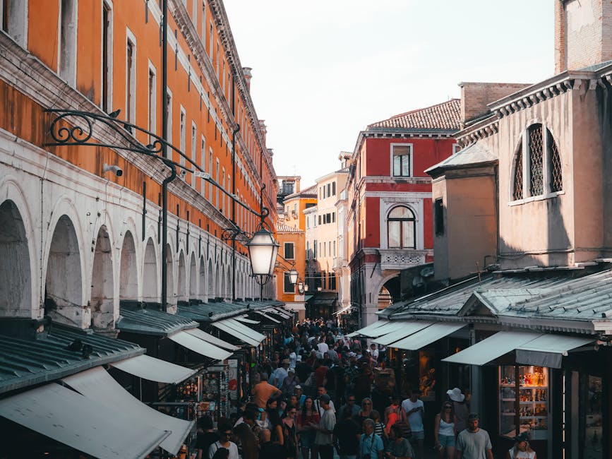 Pedestrian alley Venice with tourist crowd