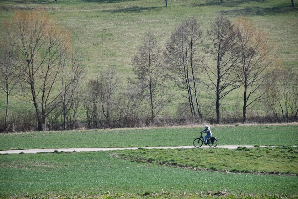 Sant Erasmo cycling past vegetable fields