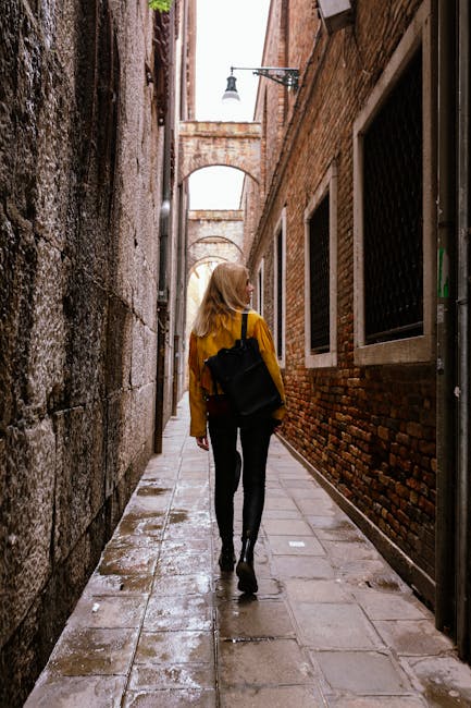 Venice light rain cobblestone street