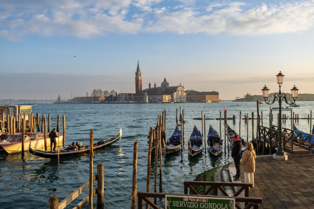 Venice gondola canal sunset couple